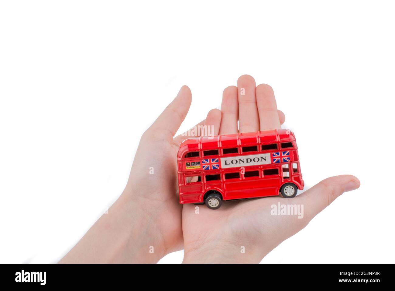 Hand holding a Bus Stock Photo Alamy