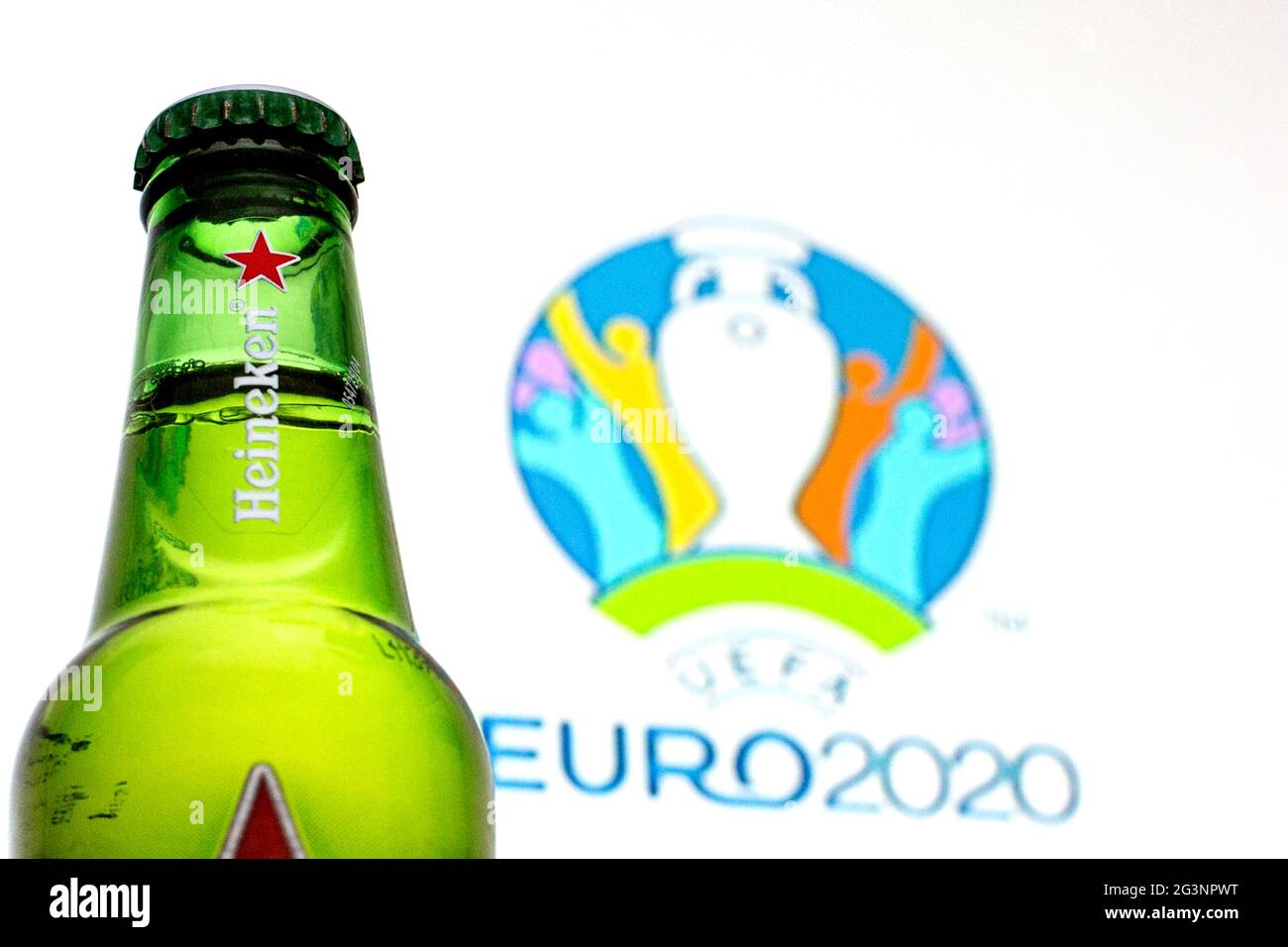 June 16, 2021, Spain: In this photo illustration a Heineken beer bottle seen displayed in front of a UEFA Euro 2020 logo in the background. (Credit Image: © Thiago Prudencio/SOPA Images via ZUMA Wire) Stock Photo