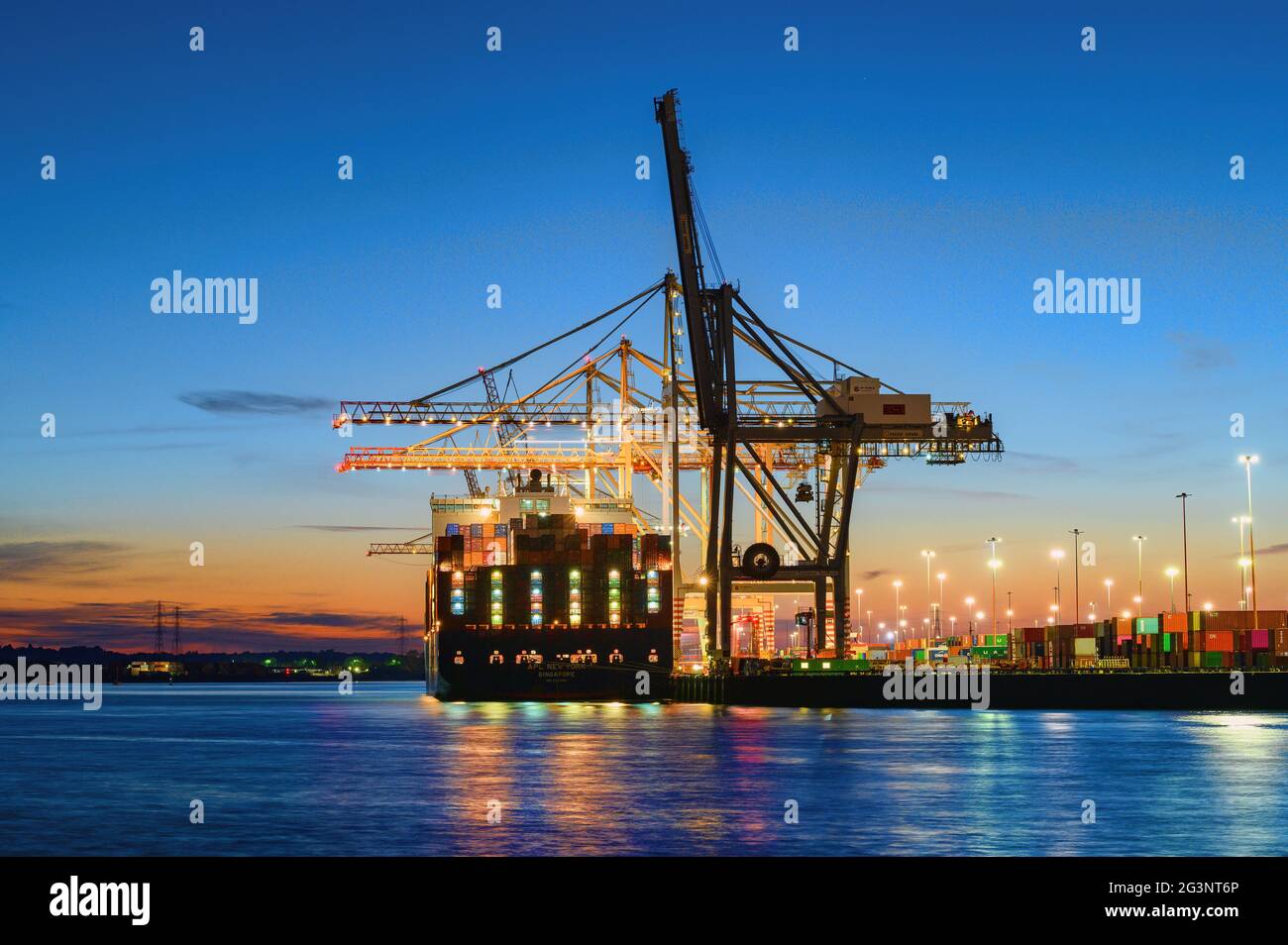 Sunset container loading operations at the DP World docks facility at ...