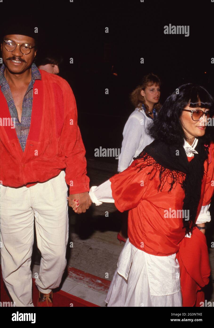 Billy Dee Williams and Teruko Nakagami attending the premiere of 'A Fine Mess' on March 19, 1986 at the Comedy Store in Hollywood, California Credit: Ralph Dominguez/MediaPunch Stock Photo
