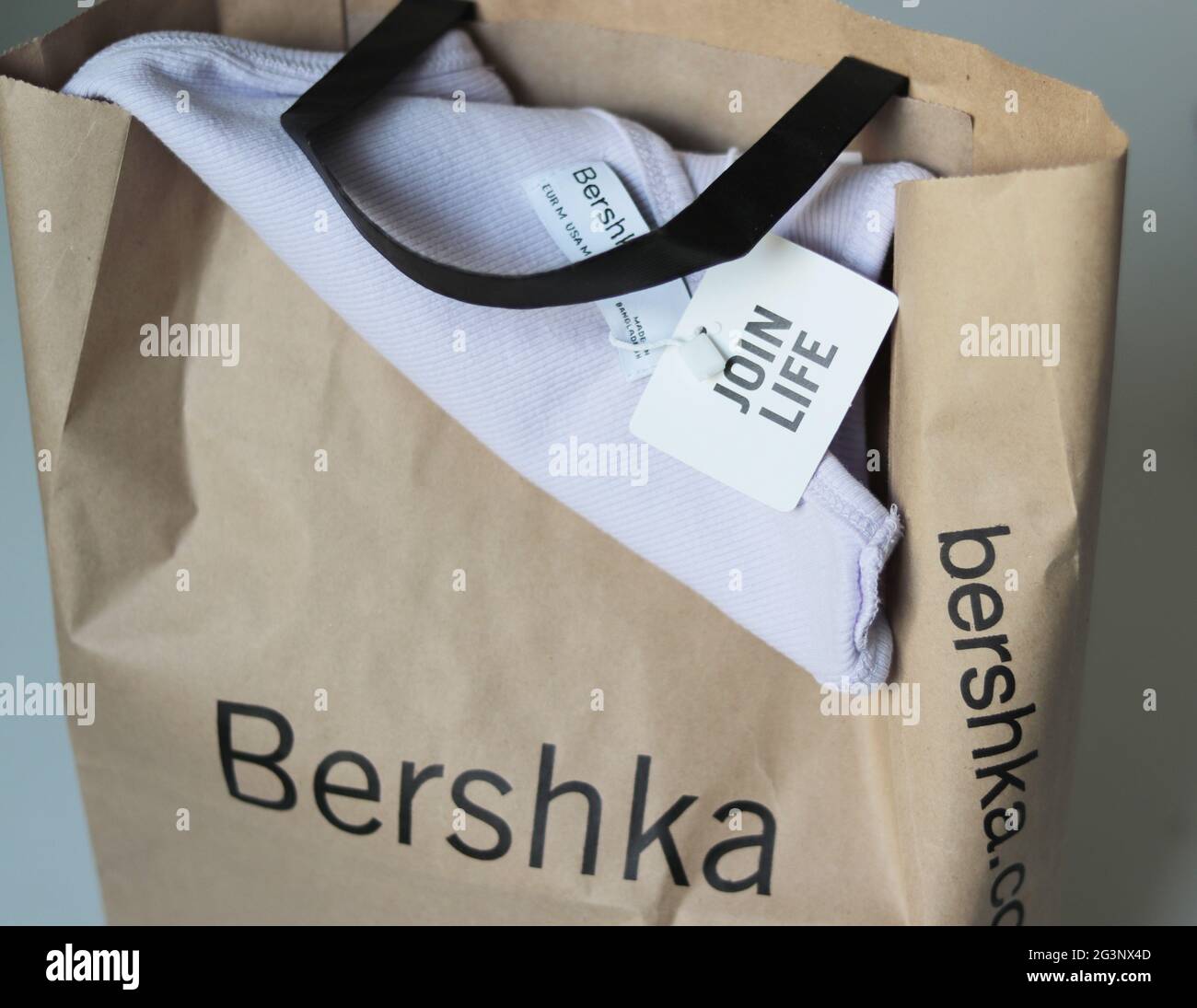 BERLIN, GERMANY - Jun 15, shirt in a bag Bershka, fashion Stock Photo - Alamy
