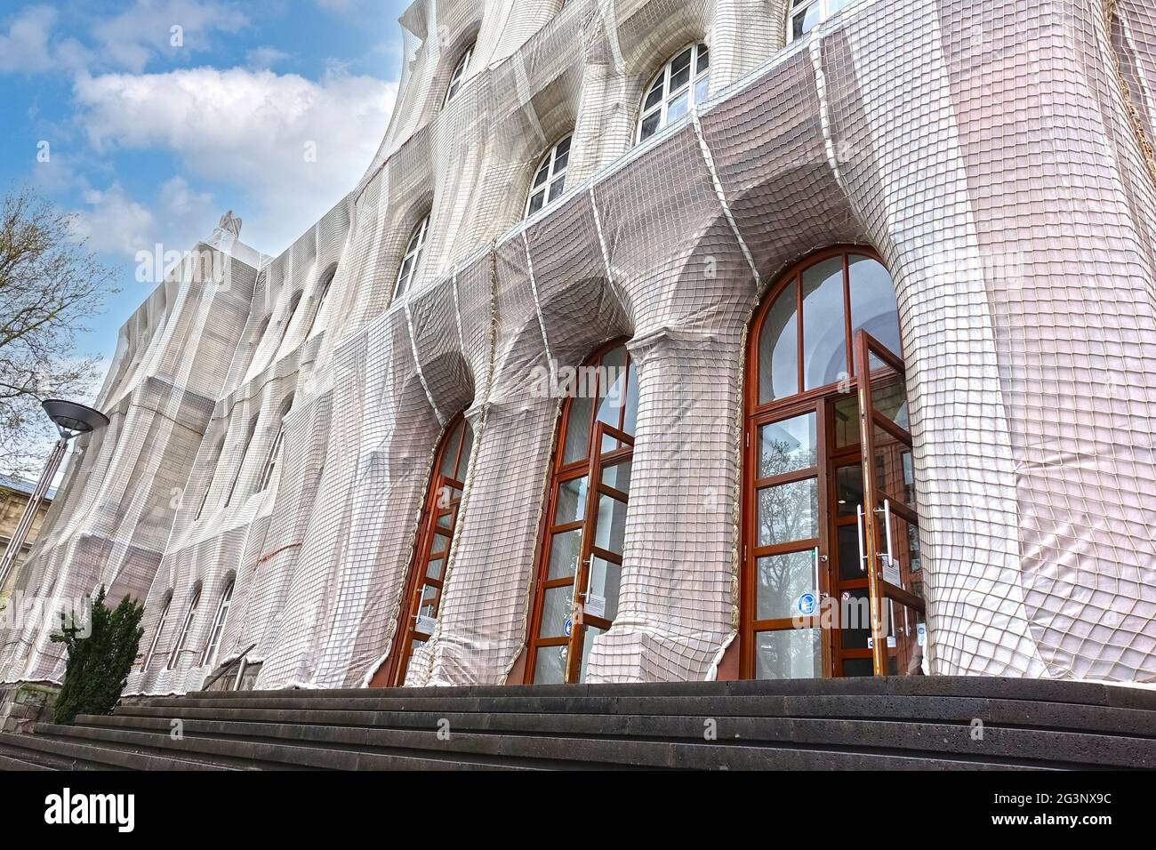 Aachen, NRW, Germany, 11.05.2021: Main building of the RWTH Aachen University, wrapped during restoration Stock Photo