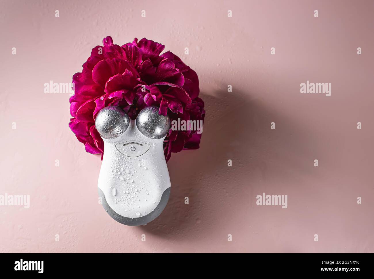 Facial massager with microcurrent attachment. Using electrical impulses