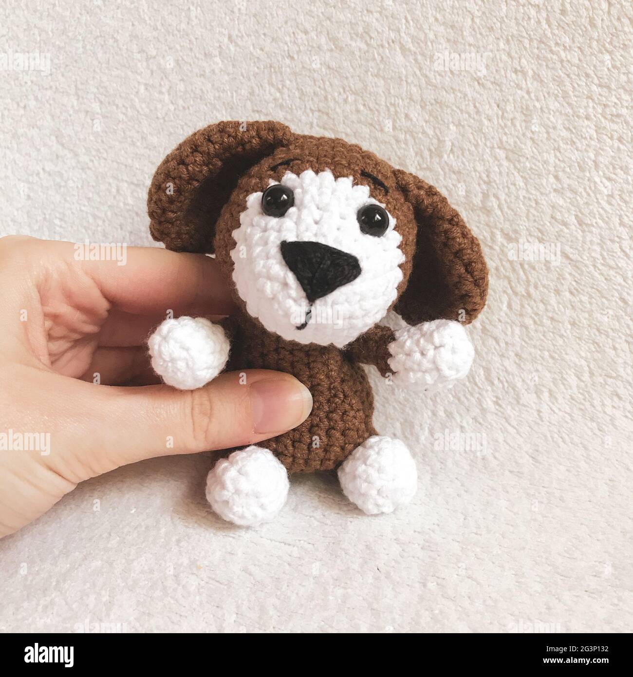 Handmade Crochet Animal Toy - Amigurumi Stuffed Toy - Puppy Dog Stock Photo