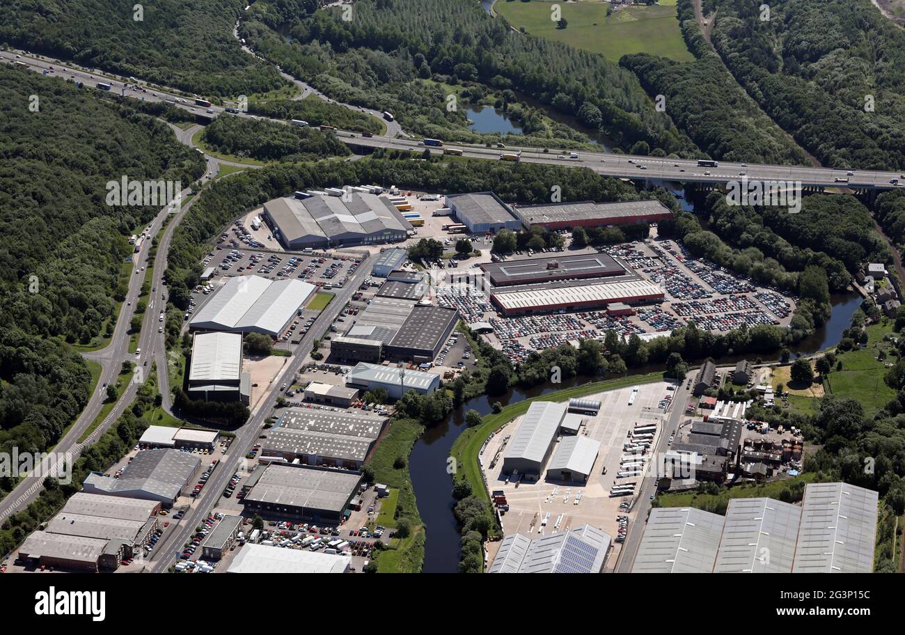 aerial view of BCA (British Car Auctions) and Clipper Logistics at J25 M62. Wakefield Industrial Estate, Armytage Road, Brighouse, West Yorkshire Stock Photo