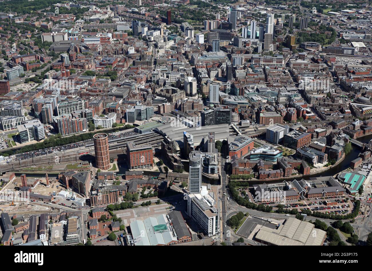 June 2021 aerial view of Leeds city centre from the south looking up Victoria Road & Neville Street up past the Station Stock Photo