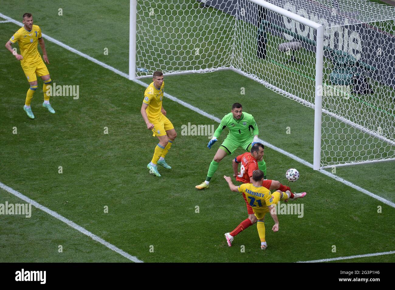 Oleksandr Karavayev of Ukraine tackles Goran Pandev of North Macedonia during the UEFA Euro 2020 Championship Group C match between Ukraine and North Macedonia at National Arena on June 17, 2021 in Bucharest, Romania BUCHAREST, ROMANIA - JUNE 17: Stock Photo