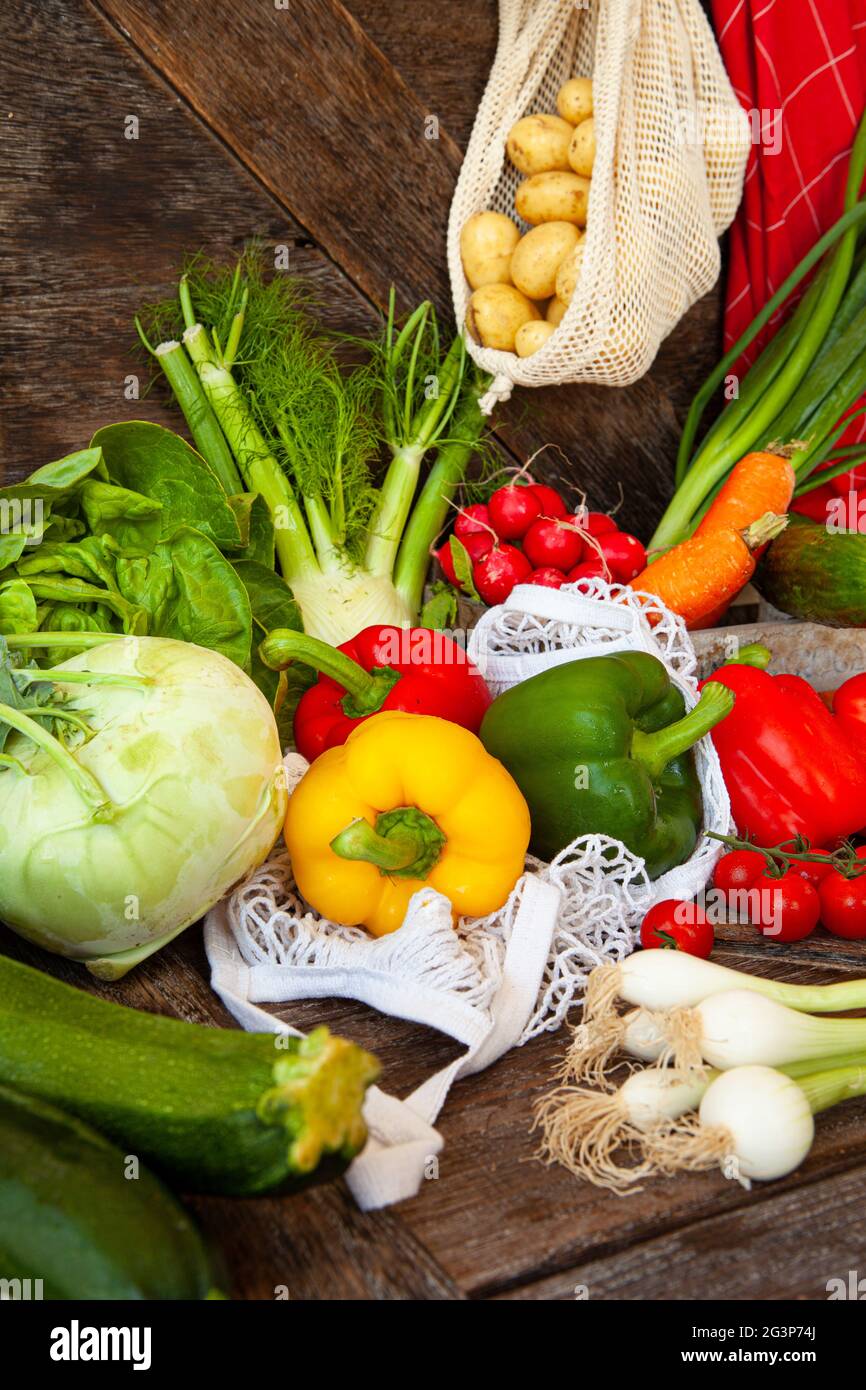 Colorful variety of fresh vegetables on rustic wooden background Stock ...