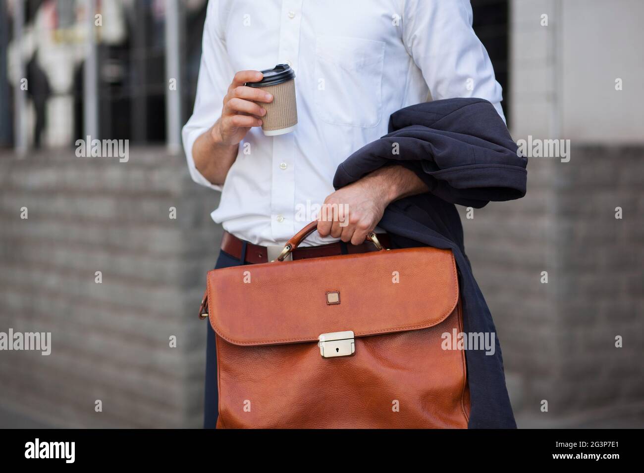 Cup Of Coffee And Briefcase Closeup Shot Stock Photo Alamy