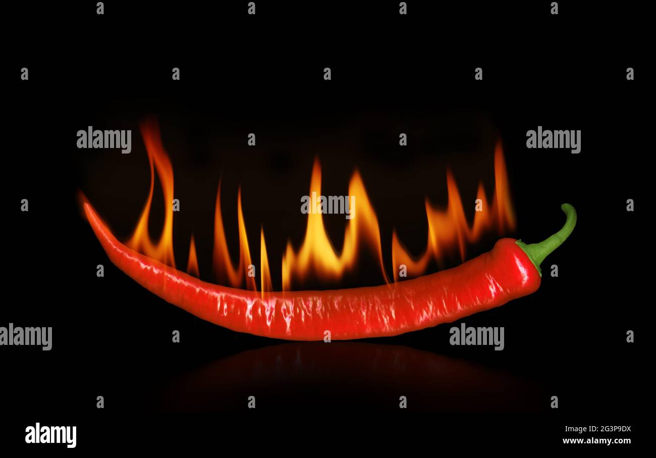 Burning pepper on black Stock Photo Alamy