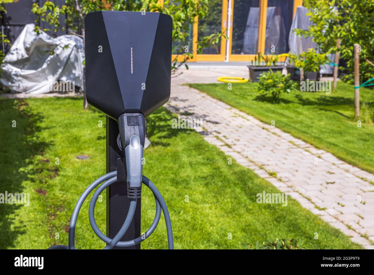 Beautiful view of charging station for electric car in front yard