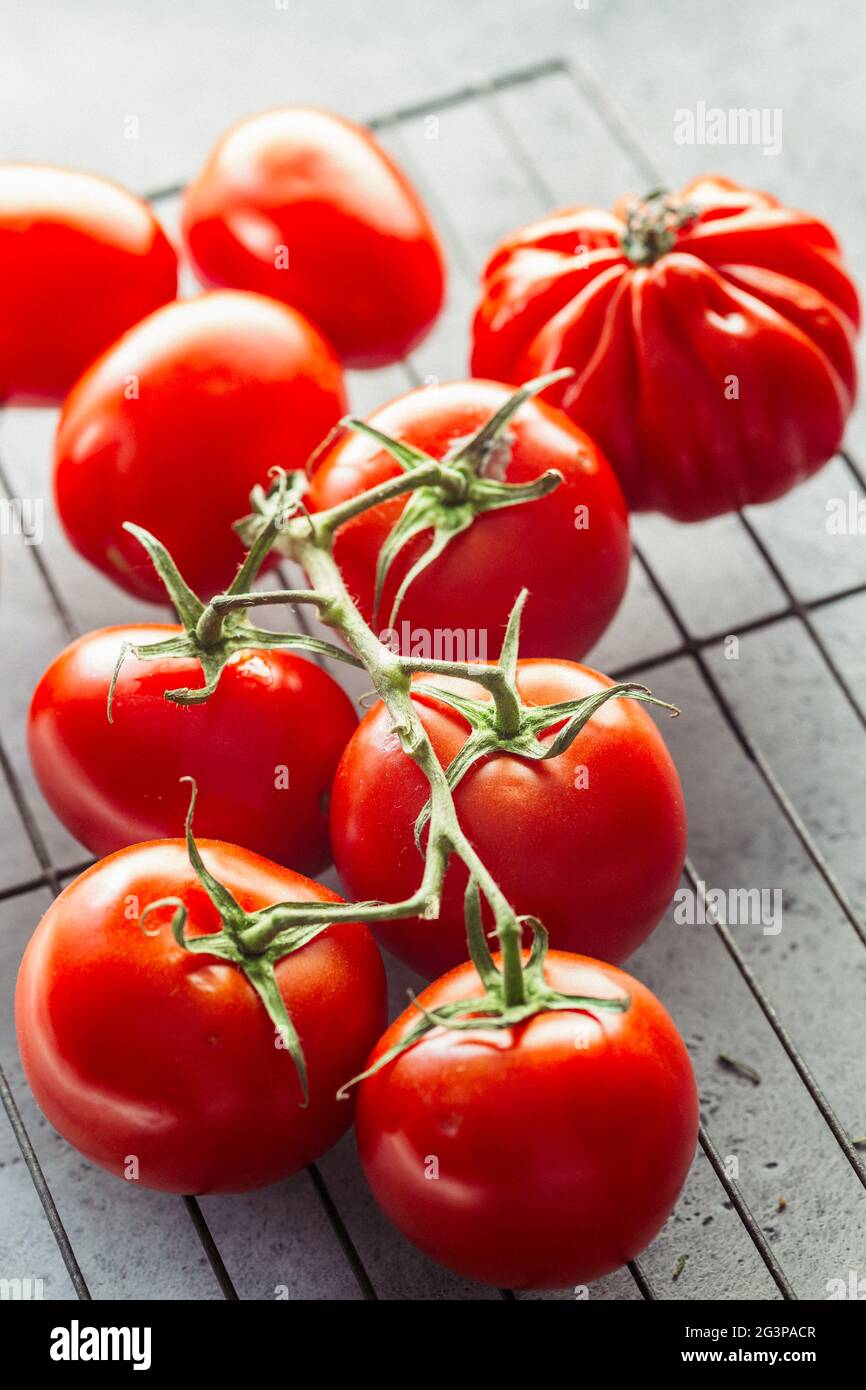 Rich Red Fresh Glossy Tomatoes Stock Photo