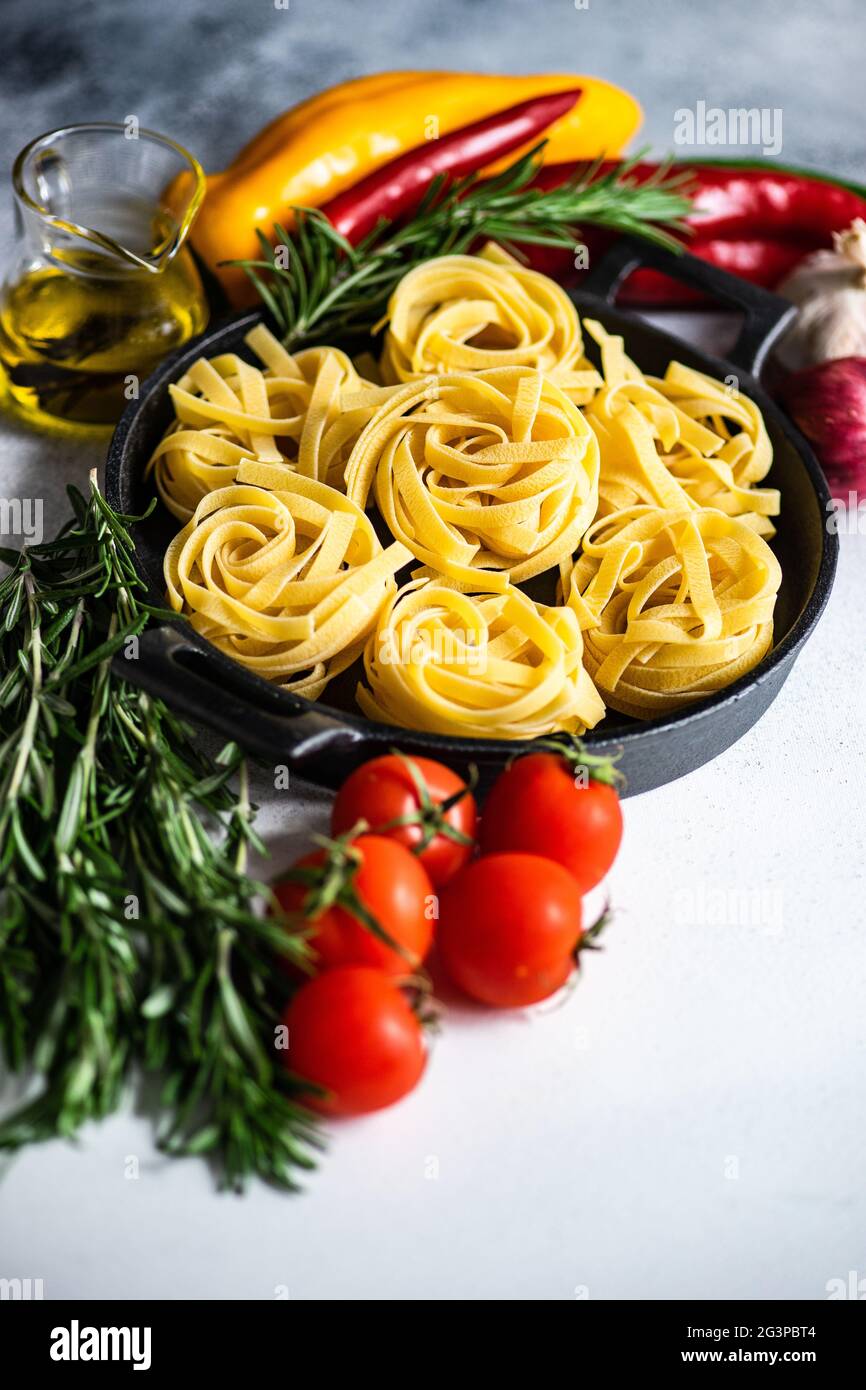Pasta and ingredients concept Stock Photo