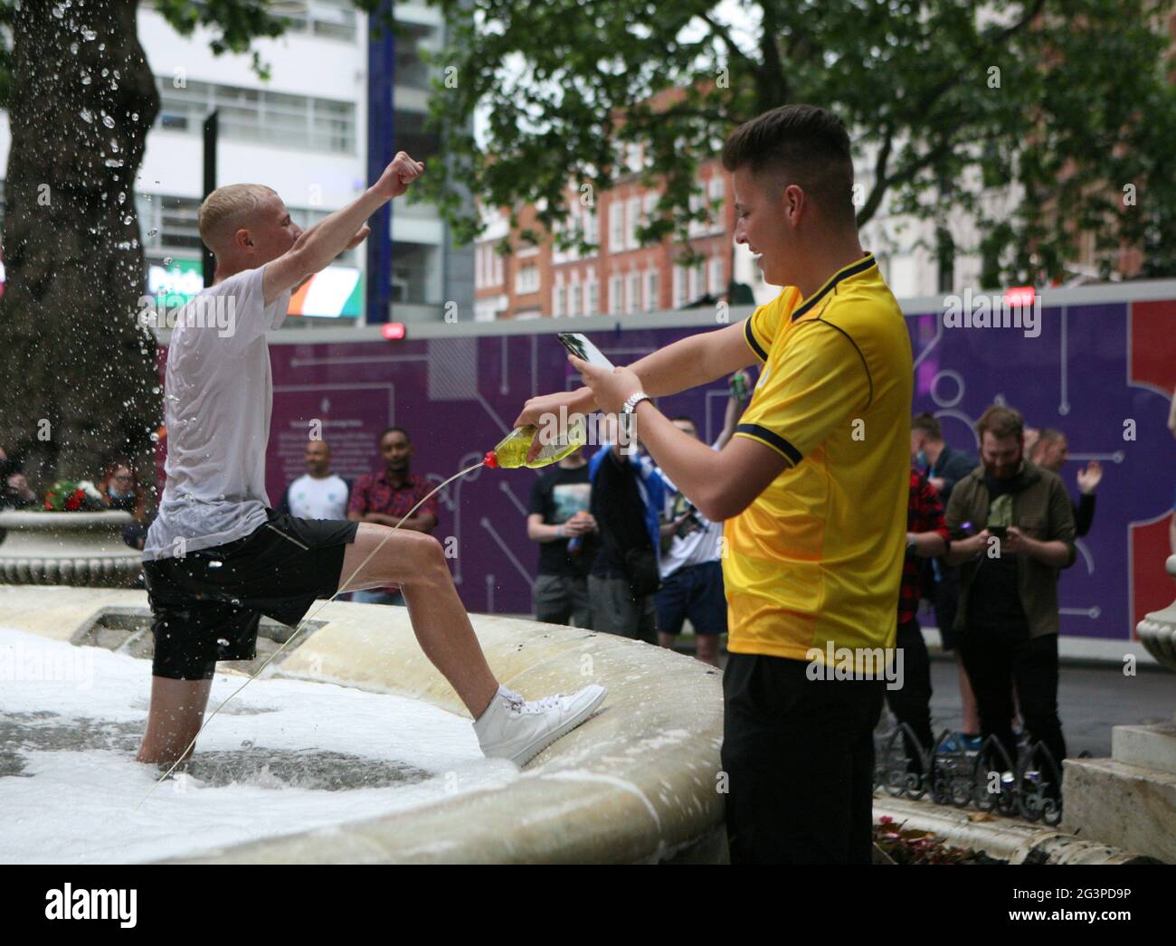 Football fans in Leicester Square, London ahead of the UEFA Euro 2020 Group D match between England and Scotland at Wembley Stadium. Picture date: Thursday June 17, 2021. Stock Photo