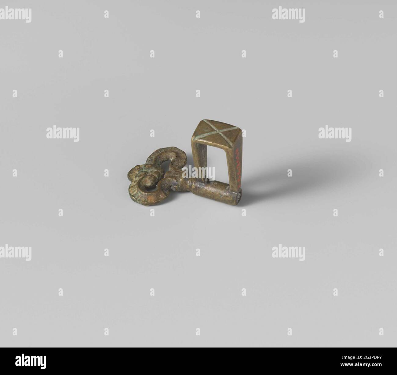 Key. Key with eye shaped by two degenerated leaf volutes, closed above ...