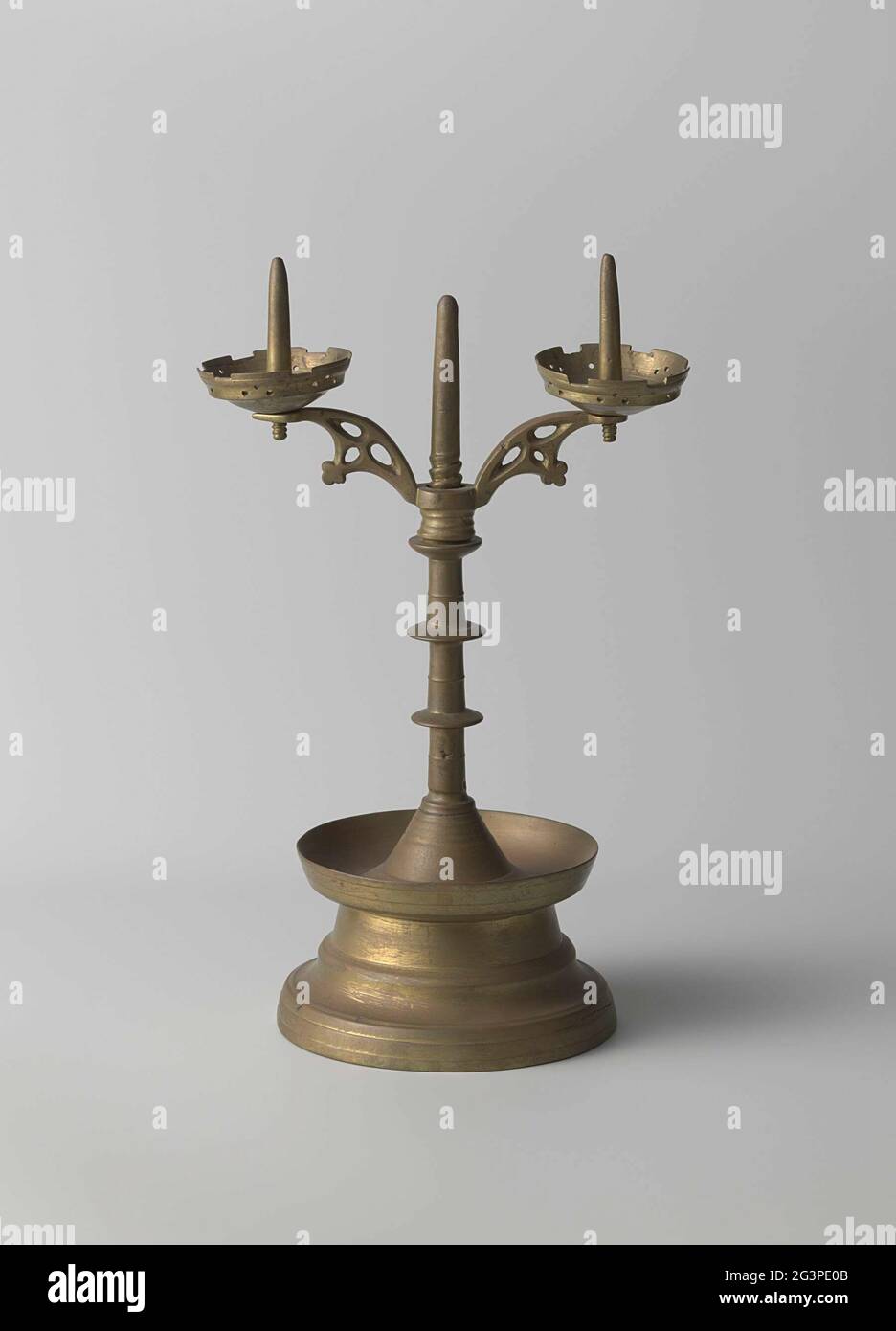 Candlestick with two arms. The profiled Konian foot has a raised edge at  the top, so that he can also serve as a fat catcher. At the foot the round  stem is