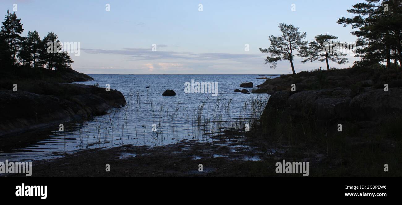 Evening scene at the shore of Lake Vanern, Sweden. Stock Photo
