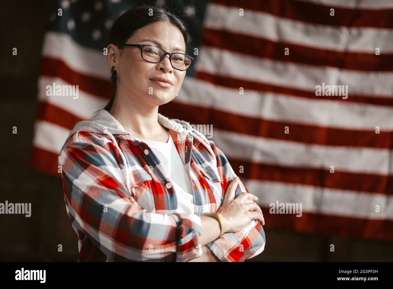Asian Mid-Aged Woman Patriotic Citizen Of America Stock Photo