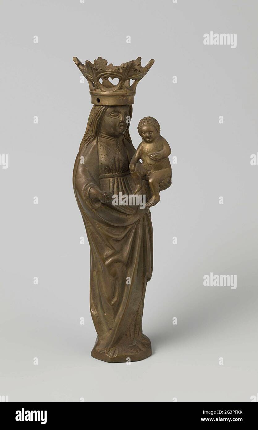 Maria with child. The image consists of four cast parts, which have been  criminated or punched: Mary, her left hand with the Christ child, her right  hand and the crown. The standing