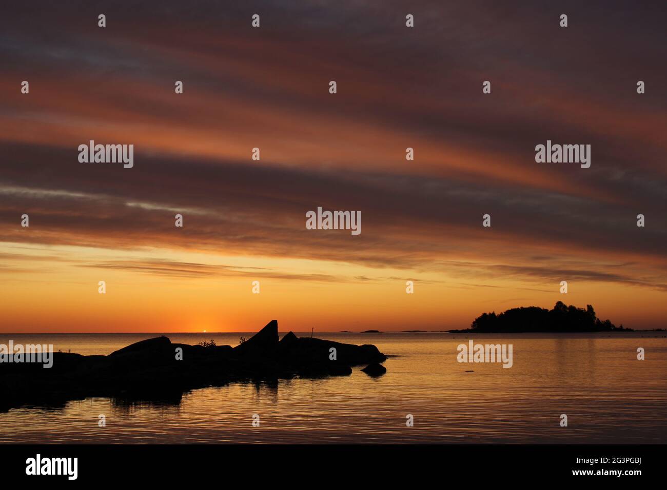 Colourful sunrise at Lake Vanern, Sweden. Stock Photo