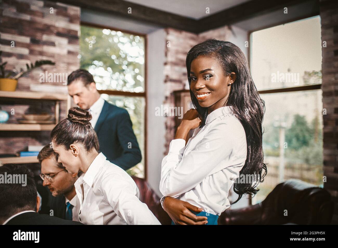 Successful Team At Work. Group Of Young Business People Stock Photo