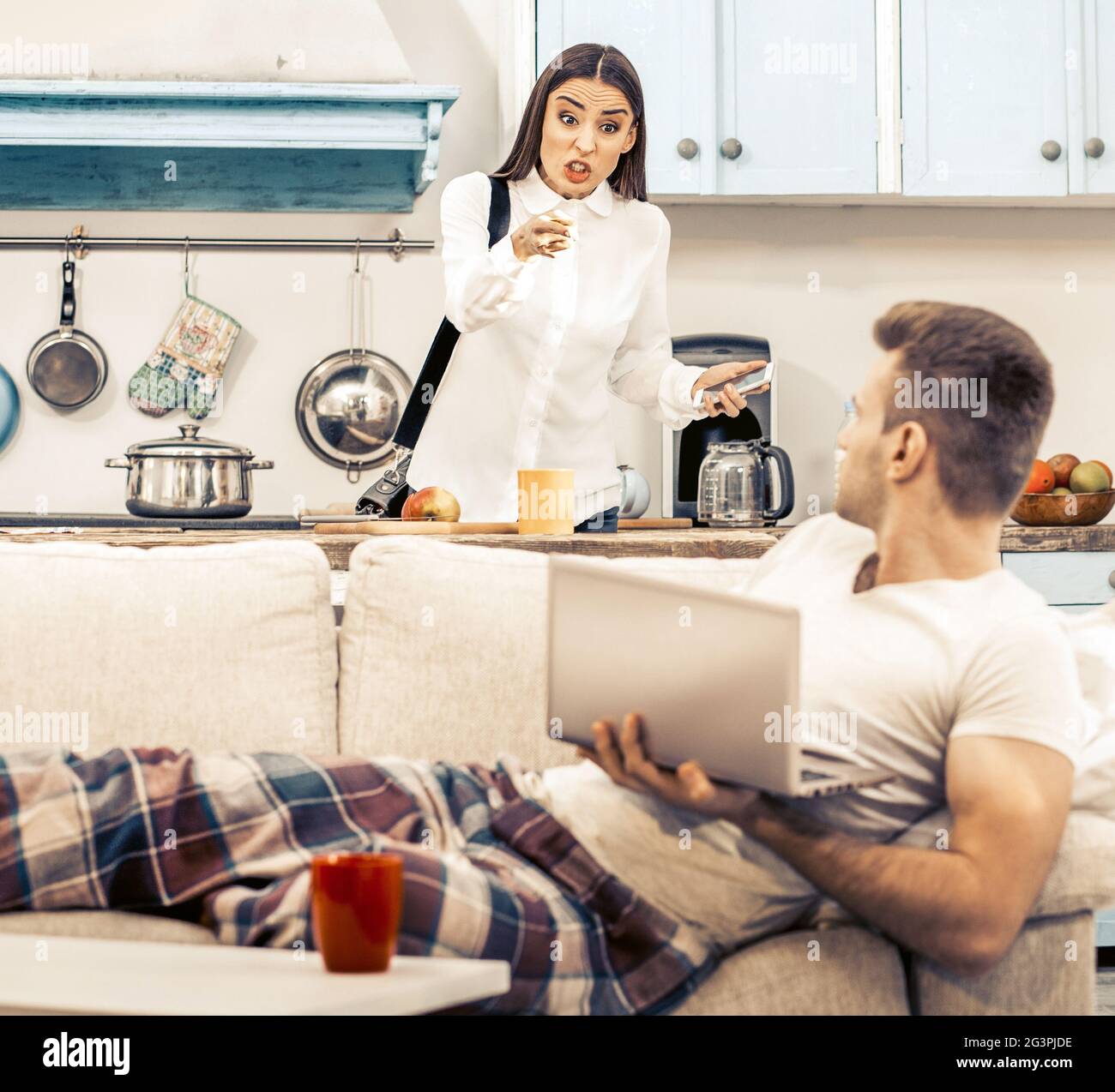 Woman Angry With her husband At Home Stock Photo