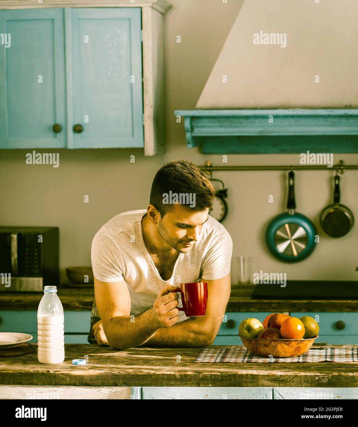 Smiling Young Man Drinking Morning Coffee With Milk Stock Photo