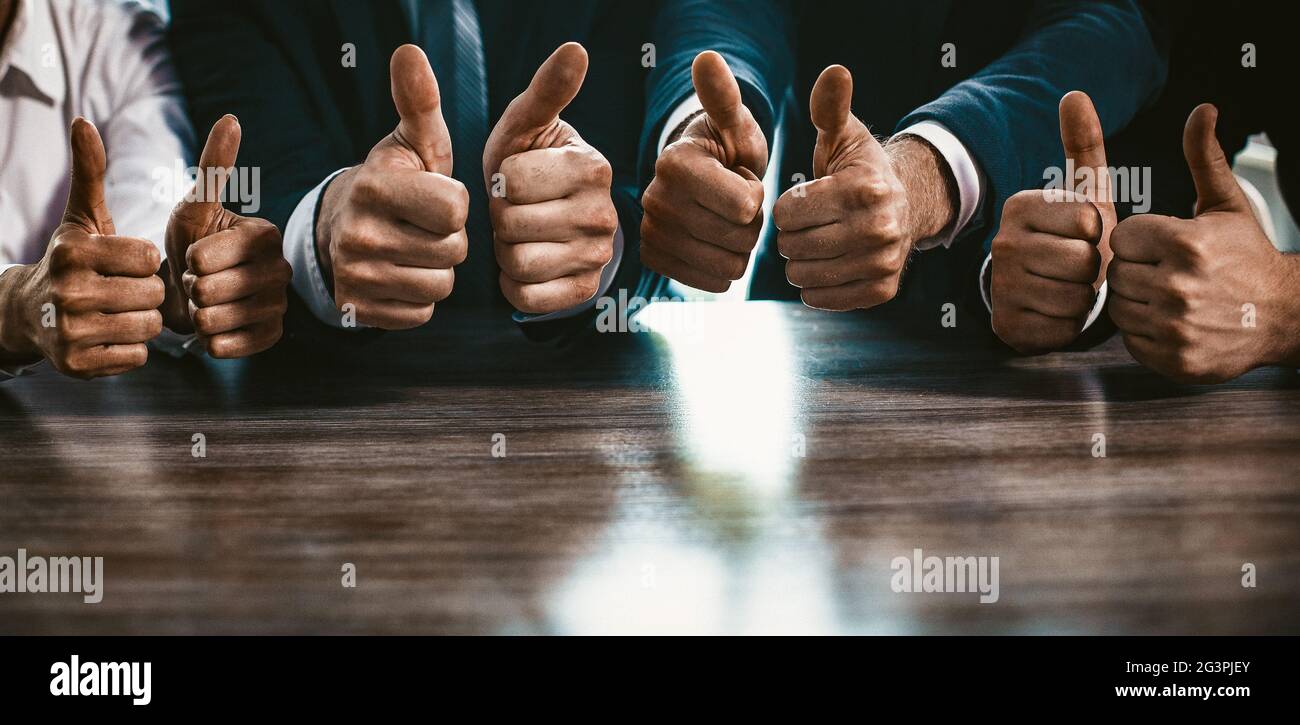 Group Of Business People Shows Thumbs Up Gestures, Close Up Stock Photo ...
