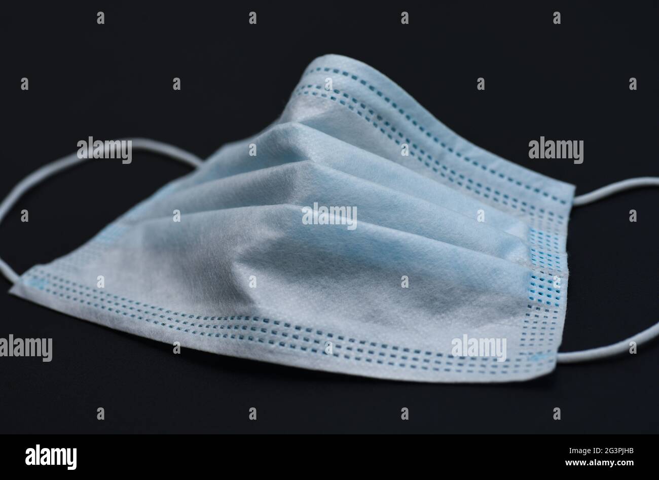 Medical gauze mask on dark background Stock Photo Alamy