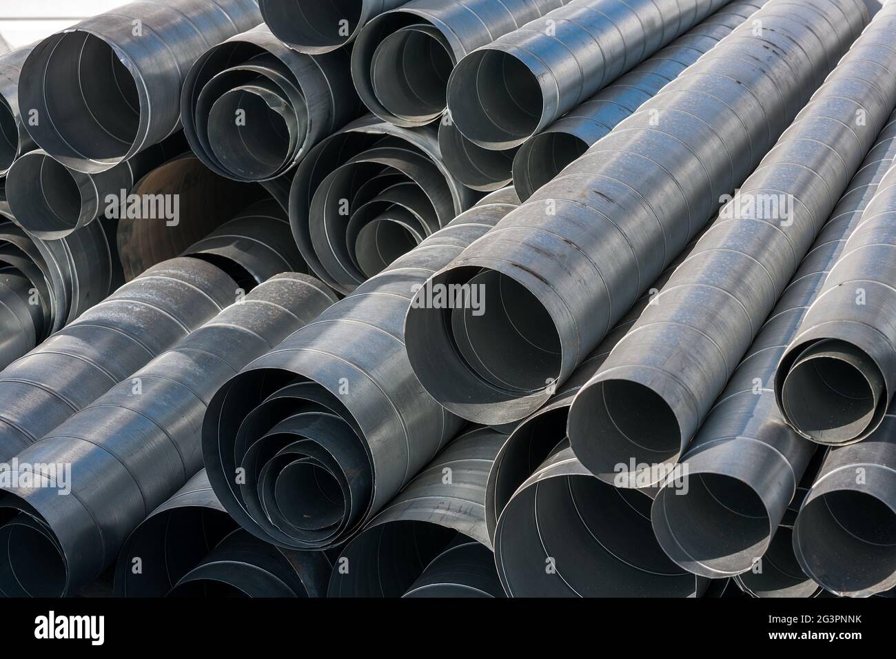 Pipes for exhaust ventilation. Background. Dismantling and construction at the facility Stock Photo