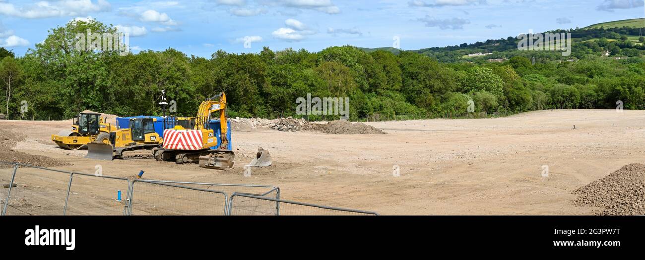 Pontypridd, Wales June 2021 Construction machines on land which has been cleared for a new