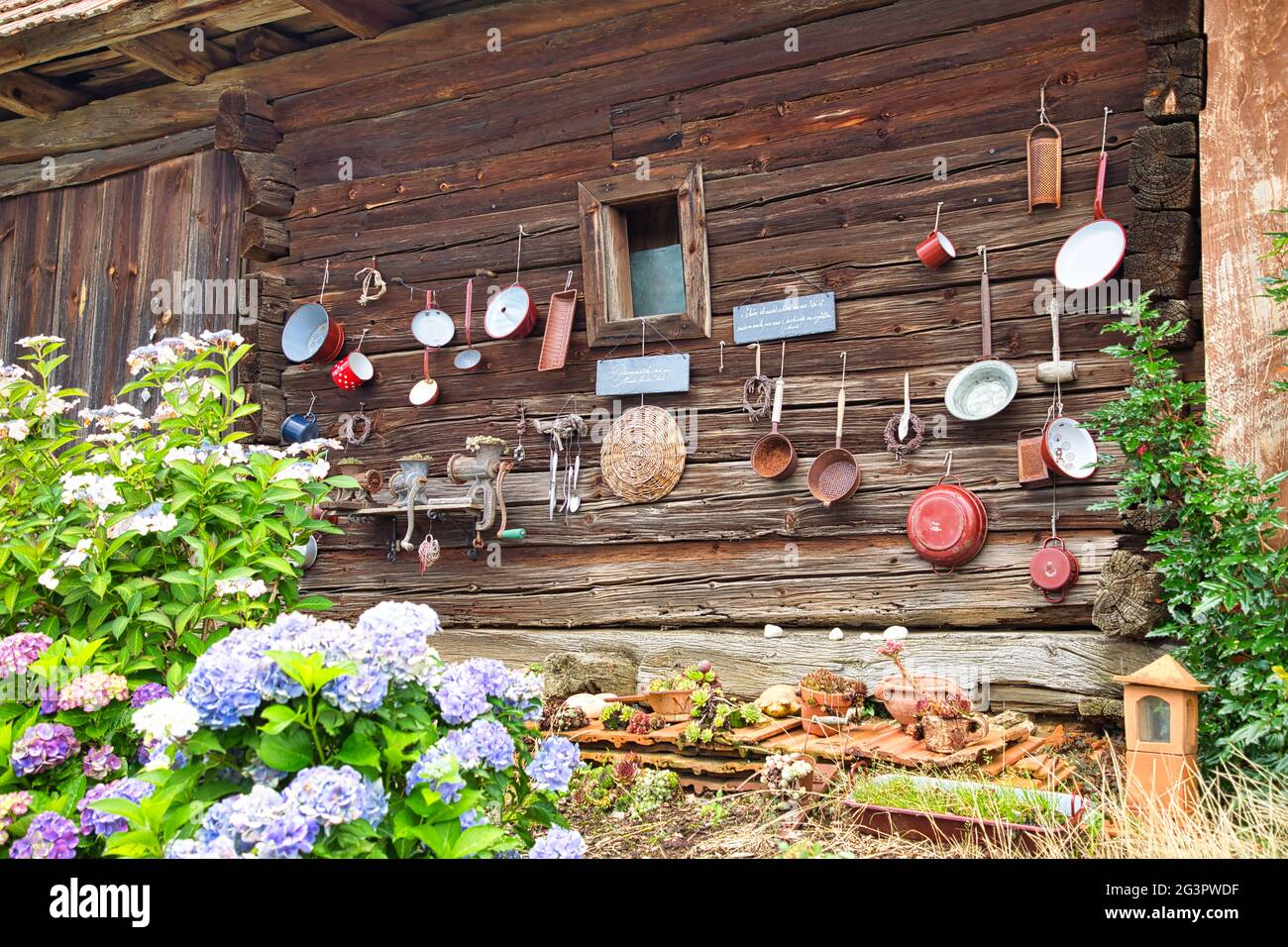 AUSTRIA, STYRIA, ST. MARTIN IM SULMTAL - JULY 24, 2020: Pretty house decoration from used household goods Stock Photo