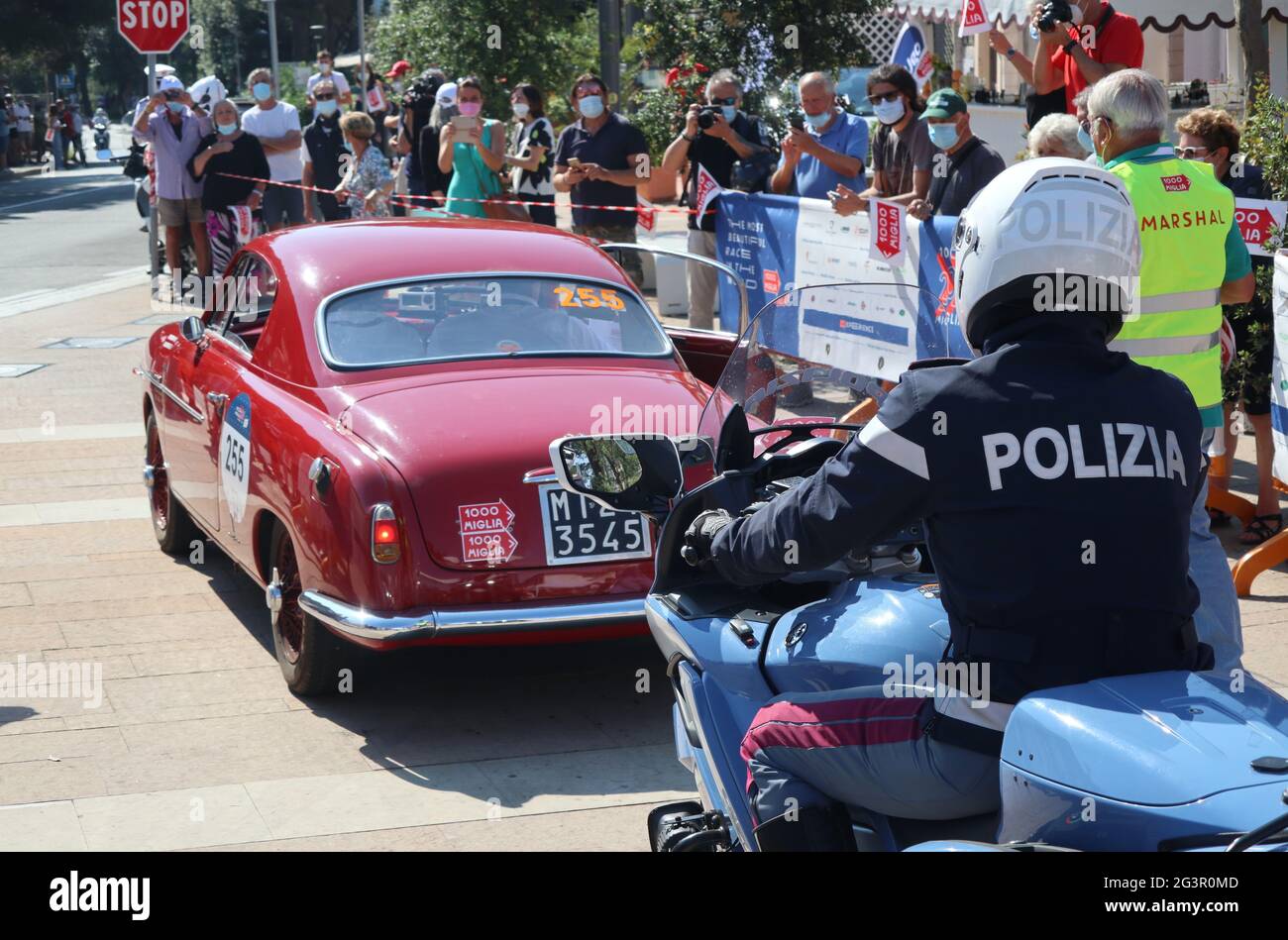 A competitor car taking the road after the stop of Castiglioncello,  Tuscany, during the Leg 2, Sector 3 (Viareggio-Roma) of 1000 Miglia Race by  on June, 17, 2021. The 2021 competition (June,