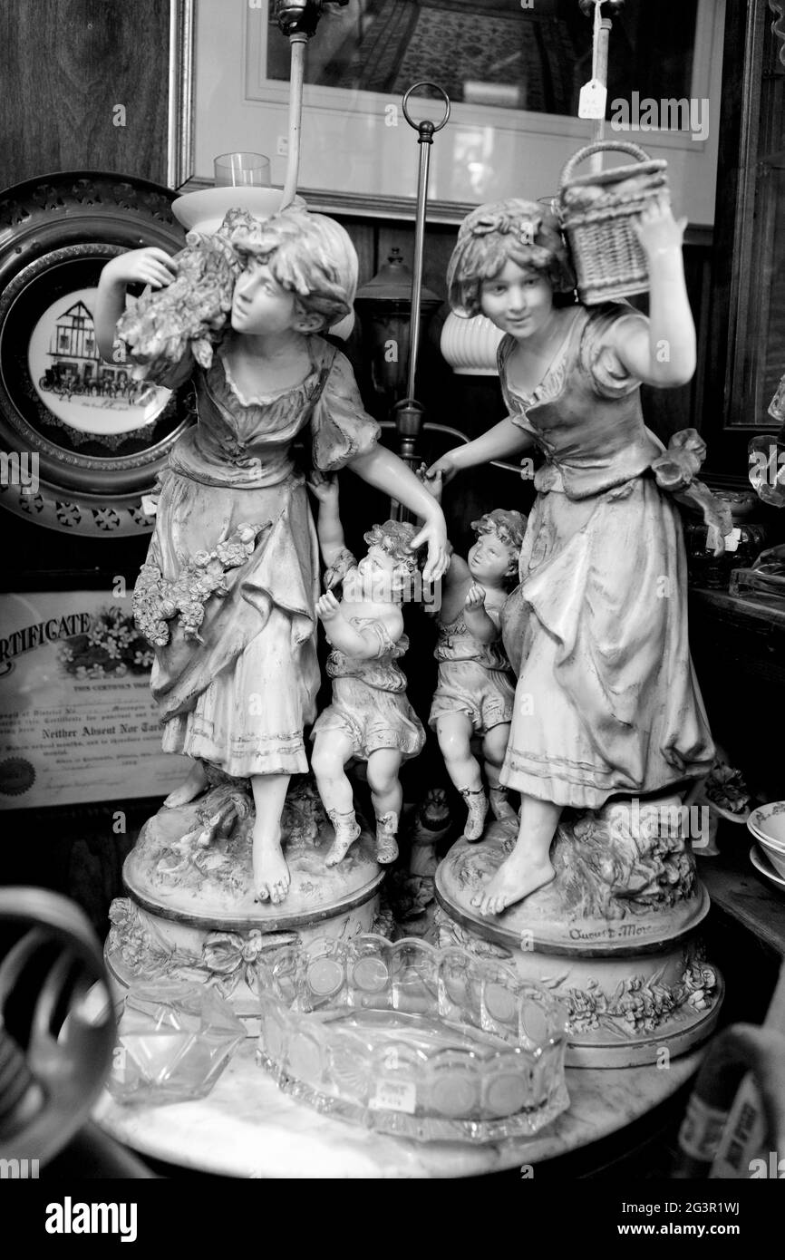 Statues of peasant woman with children in other collectables in Antique