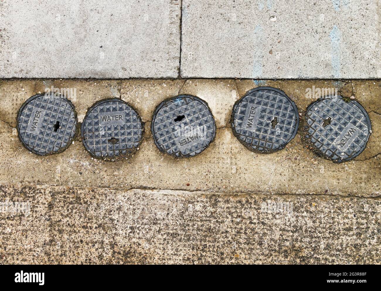 Hydrant access cover hires stock photography and images Alamy