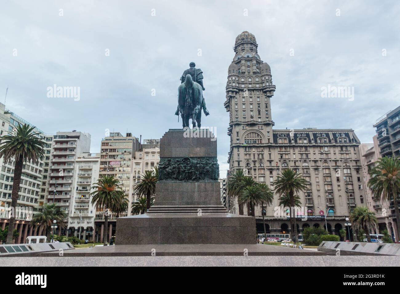 MONTEVIDEO, URUGUAY - FEB 18, 2015: View of Palacio Salva building and Artigas mausoleum at Plaza Independecia square in the center of Montevideo. Stock Photo