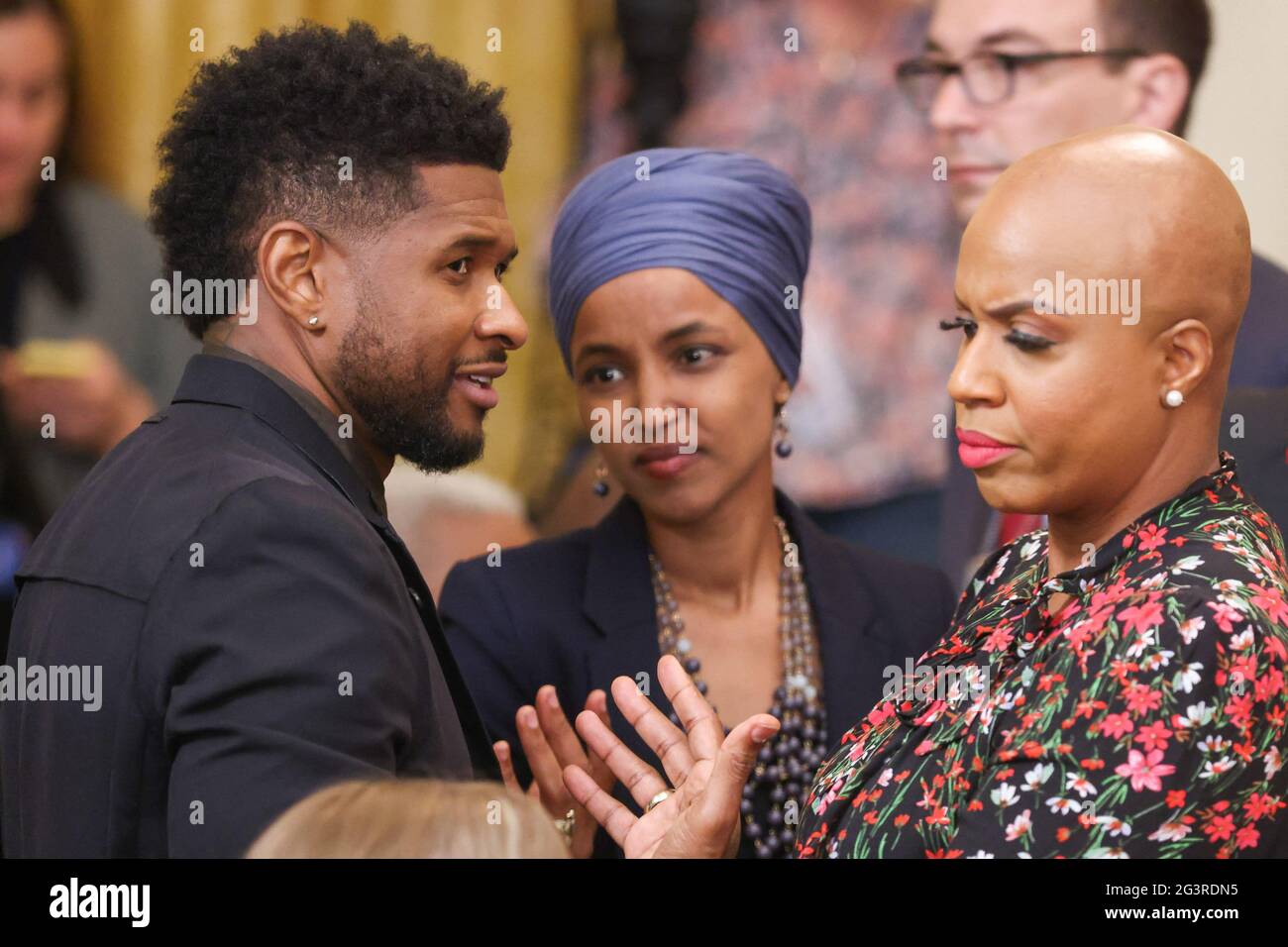 Musician Usher, Rep. Ilhan Omar (DMN) and Congresswoman Ayanna