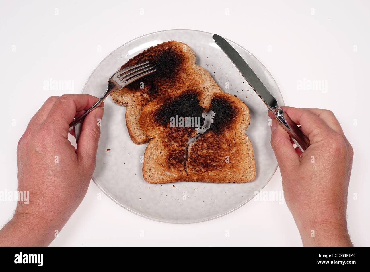 Eating Burned Toast Stock Photo Alamy