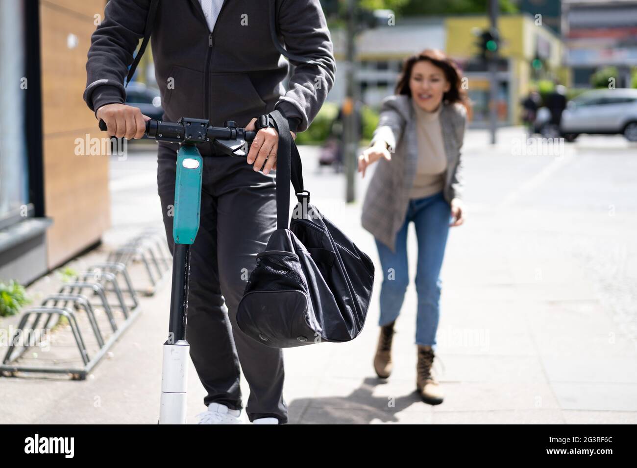 Pickpocket Robber Stealing Bag In Street. Robbery Crime Stock Photo Alamy