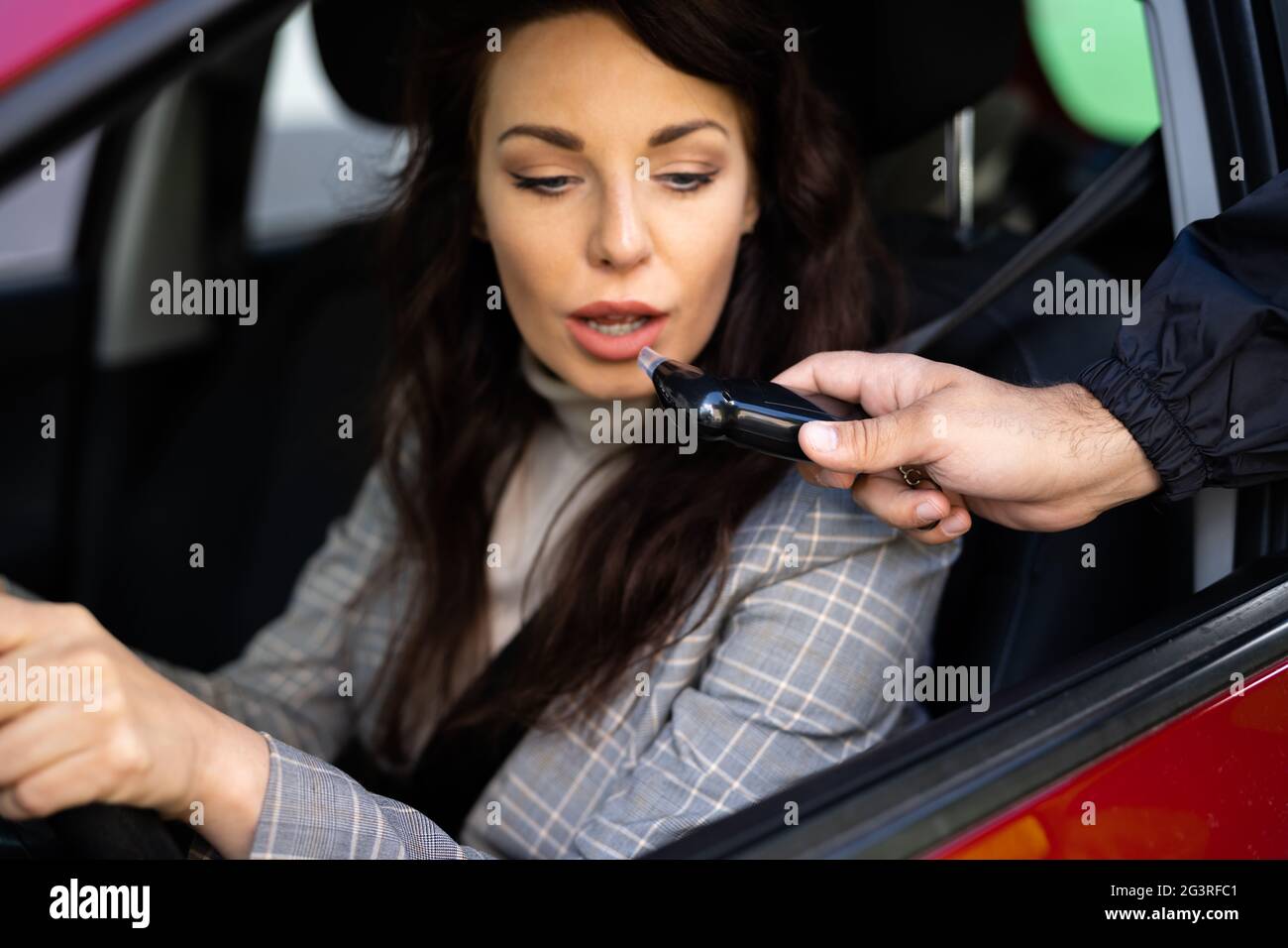 Police, alcohol testing device, breath analyzer. Traffic control, alcohol  control of car driver Stock Photo - Alamy