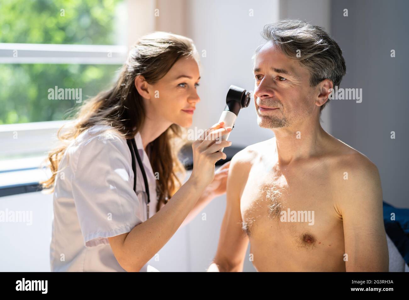 Dermatologist Checking Skin Allergy And Pigment Problems Stock Photo