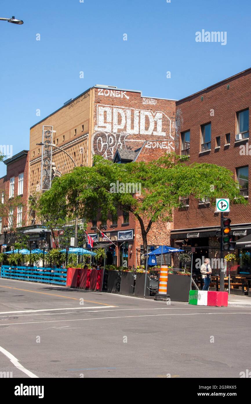 The patio of the Burgundy Lion Pub and other restaurants on Notre-Dame Street in Montreal neighbourhood of Little Burgundy Stock Photo