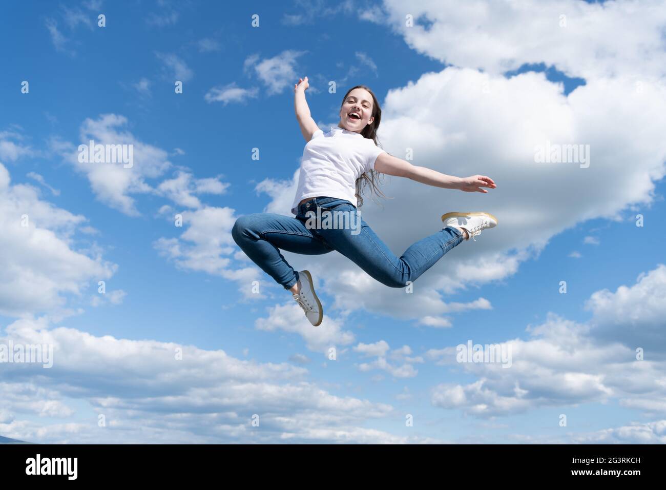 Young and free. future of sport. outdoor activity. healthy child jumping outdoor. kid full of energy Stock Photo