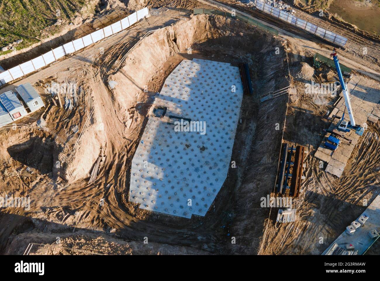 Сonstruction site with foundation pit for monolithic reinforced