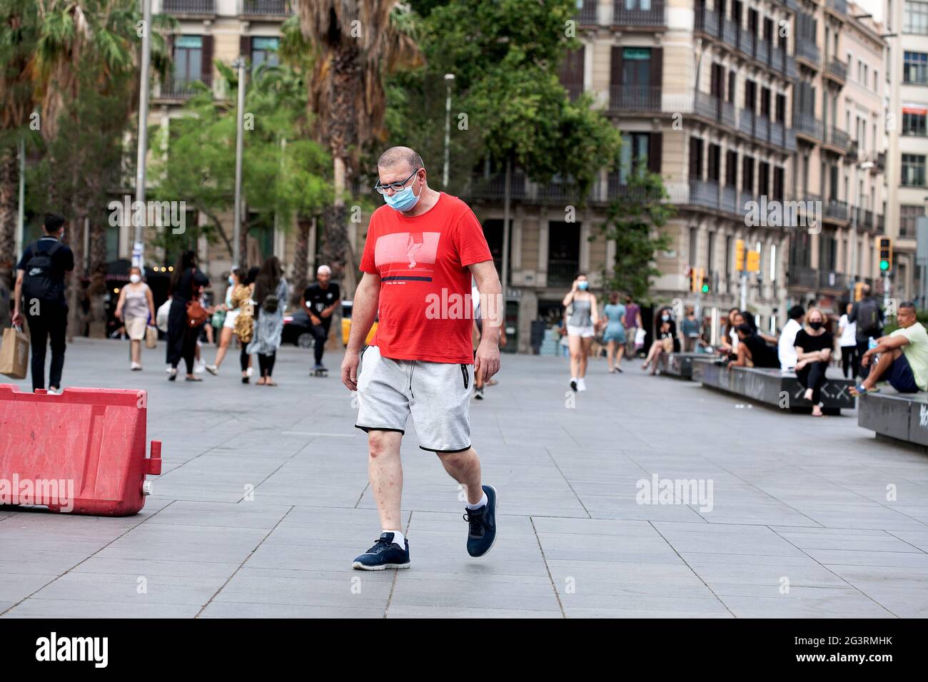 Man walking in central Barcelona, Spain. Stock Photo