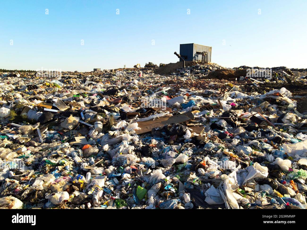 Garbage dump with plastic bags and food waste. Trash disposal ...