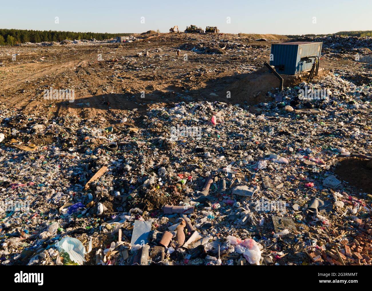 Garbage dump with plastic bags and food waste. Recycling of waste on