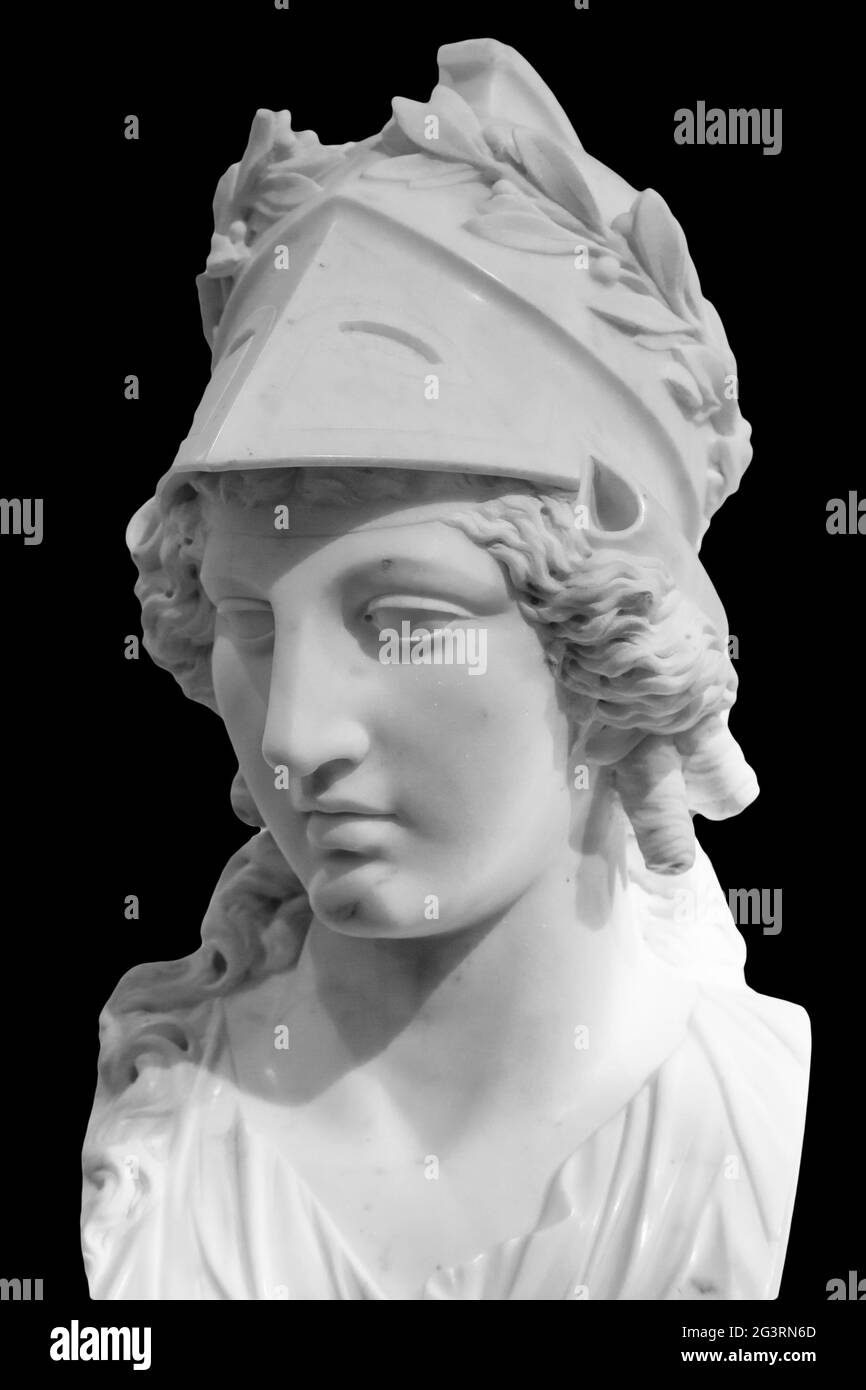 Greek ancient statue of goddess Athena. Woman marble head in helmet sculpture isolated on black Stock Photo