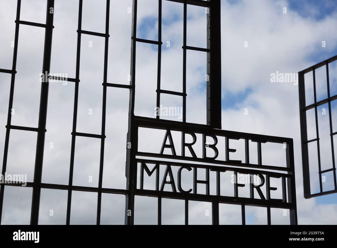 Entrance of Sachsenhausen-Oranienburg Nazi concentration camp. Arbeit macht frei German phrase, work sets you free. A false prom Stock Photo