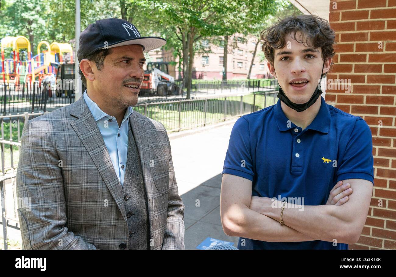 New York, USA. 17th June, 2021. John Leguizamo and his son Lucas seen as  mayoral candidate Andrew Yang touts cash relief plan to eradicate poverty  while campaigning in the Bronx River Projects
